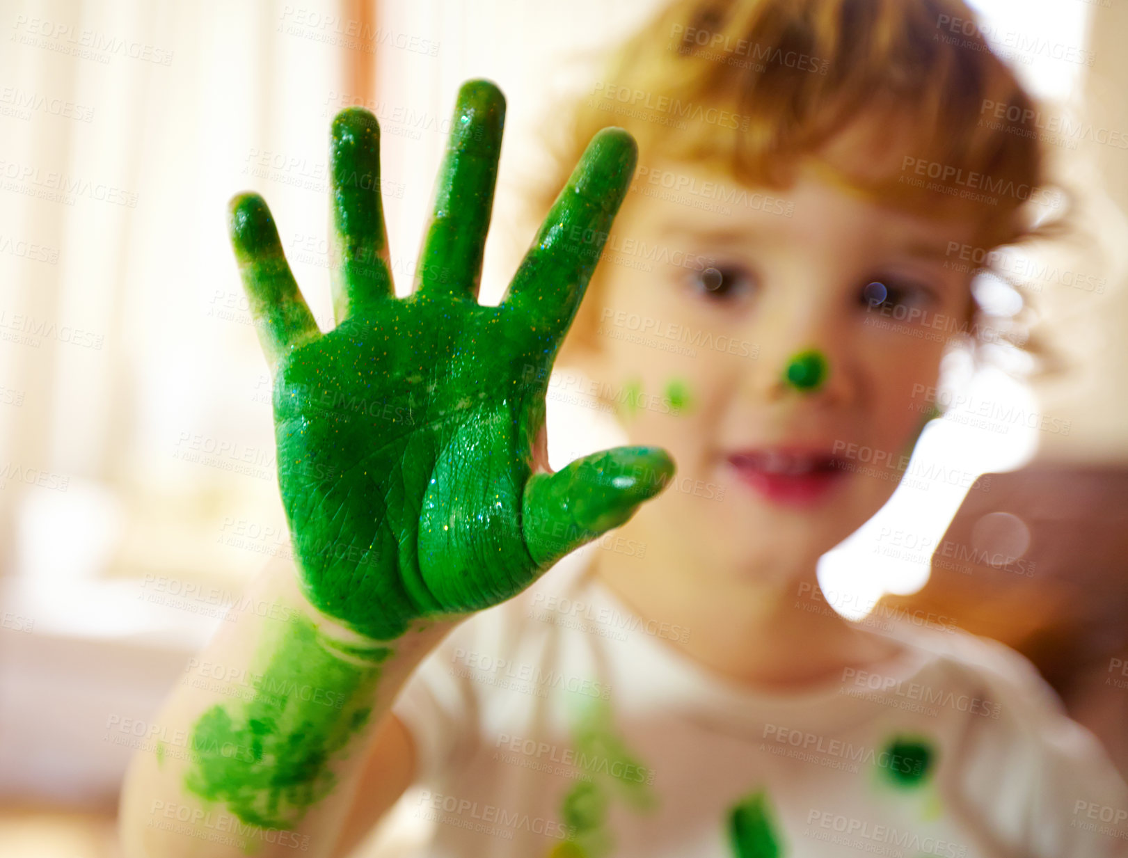 Buy stock photo Preschool, hand  and  paint for boy, color and creativity, growth and development of child with mess. Childcare, learning and craft for artwork, closeup and smile of kid, happy and young painter