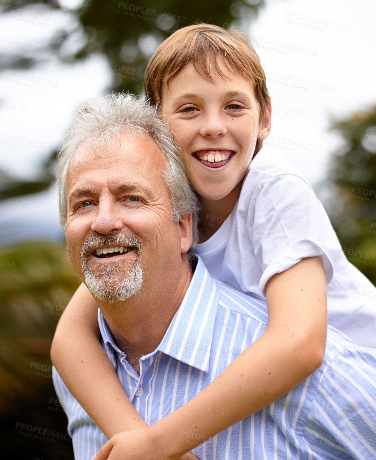 Buy stock photo Shot of a father and son spending time at the park