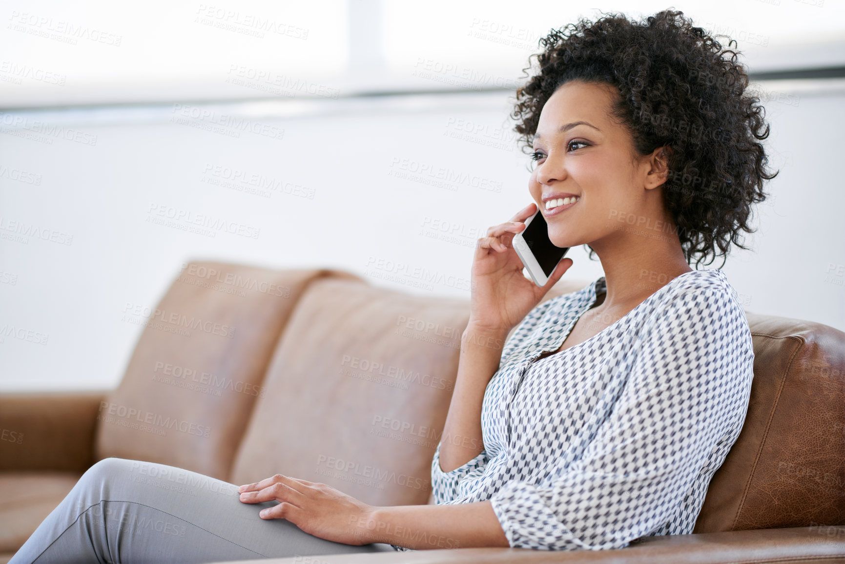 Buy stock photo Black woman, home and phone call with sofa, happiness and communication for tracking, online and order. Female person, mobile technology and connection in lounge for contact, conversation and chat