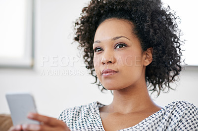 Buy stock photo Black woman, home and smartphone with idea, thinking or planning for tracking, online or order. Female person, mobile application and serious for connection, text or contact in conversation or chat