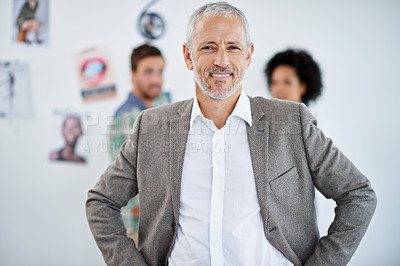 Buy stock photo Mature man, portrait and happy in office with confident for company growth as magazine editor. Employee, boss and ceo with smile for small or startup business as publisher, journalist and writer