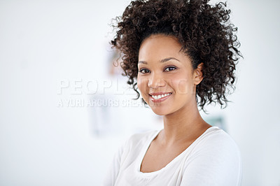 Buy stock photo Portrait of an attractive young woman standing in the office. The commercial designs displayed  represent a simulation of a real product and have been changed or altered enough by our team of retouching and design specialists so that they don't have copyright infringements