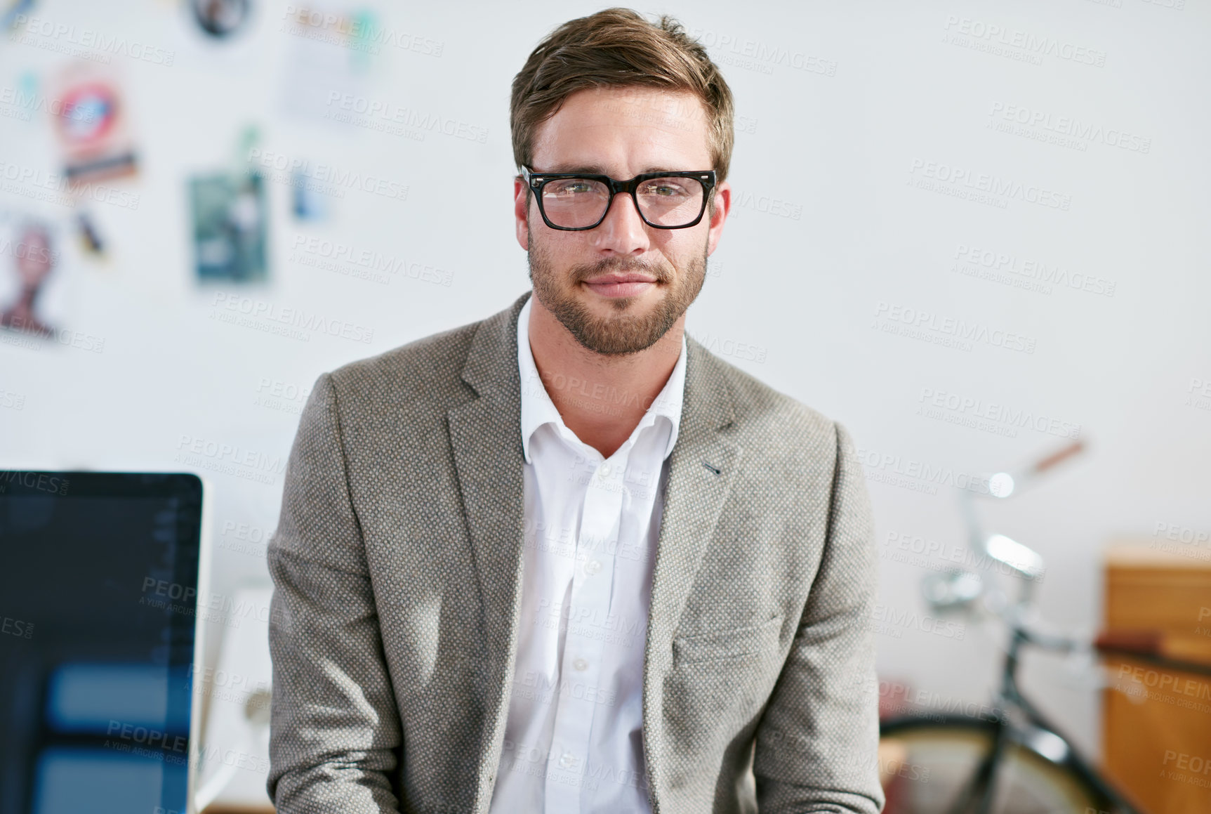 Buy stock photo Portrait, eyewear and focus with a business man in the office for corporate or professional work. Face, glasses and leadership with a young male manager or leader at work on a blurred background