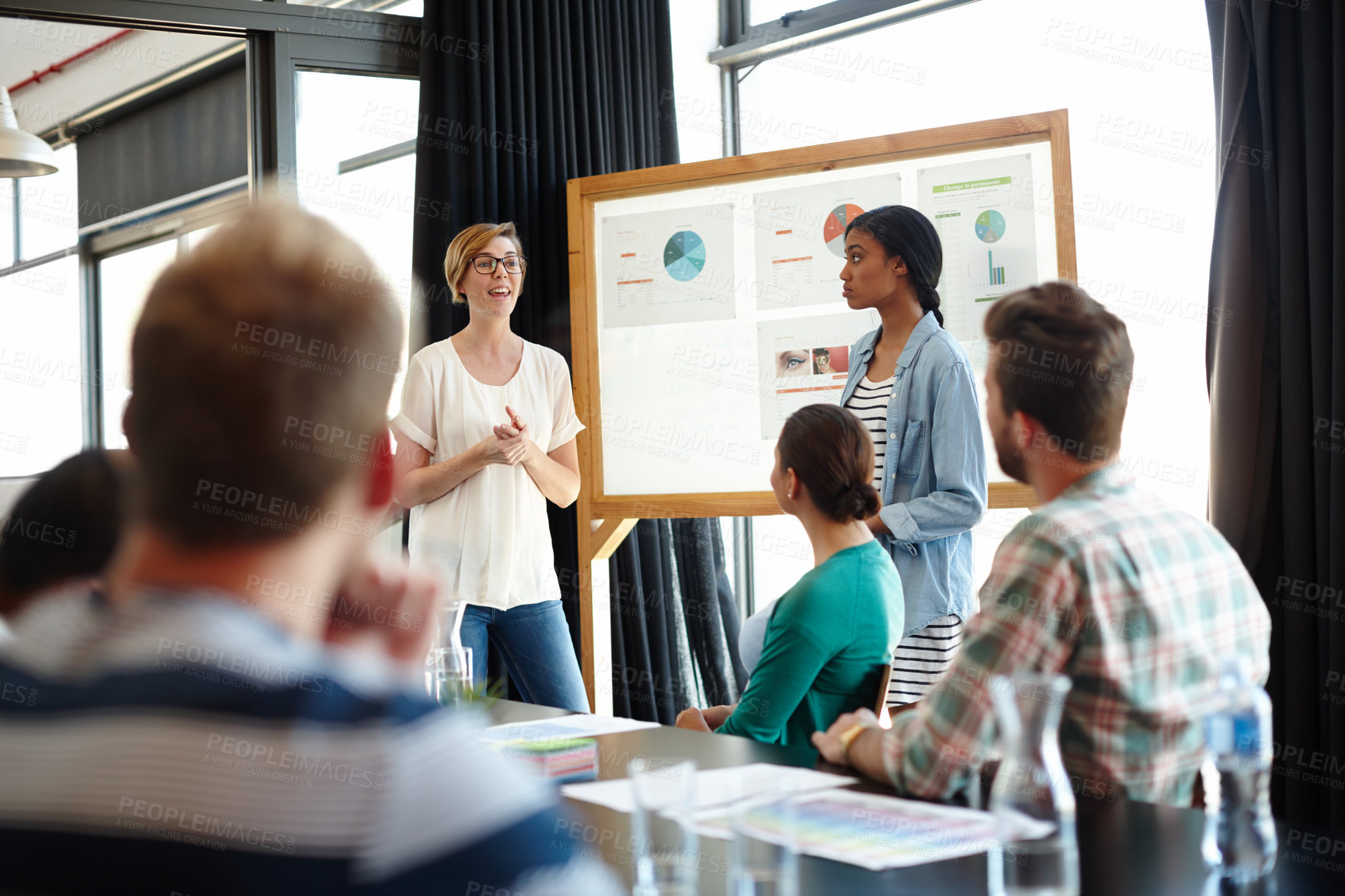Buy stock photo Creative, presentation and business people in meeting together in discussion, project management or collaboration. Workshop, planning and design team with charts, graphs and proposal for growth ideas