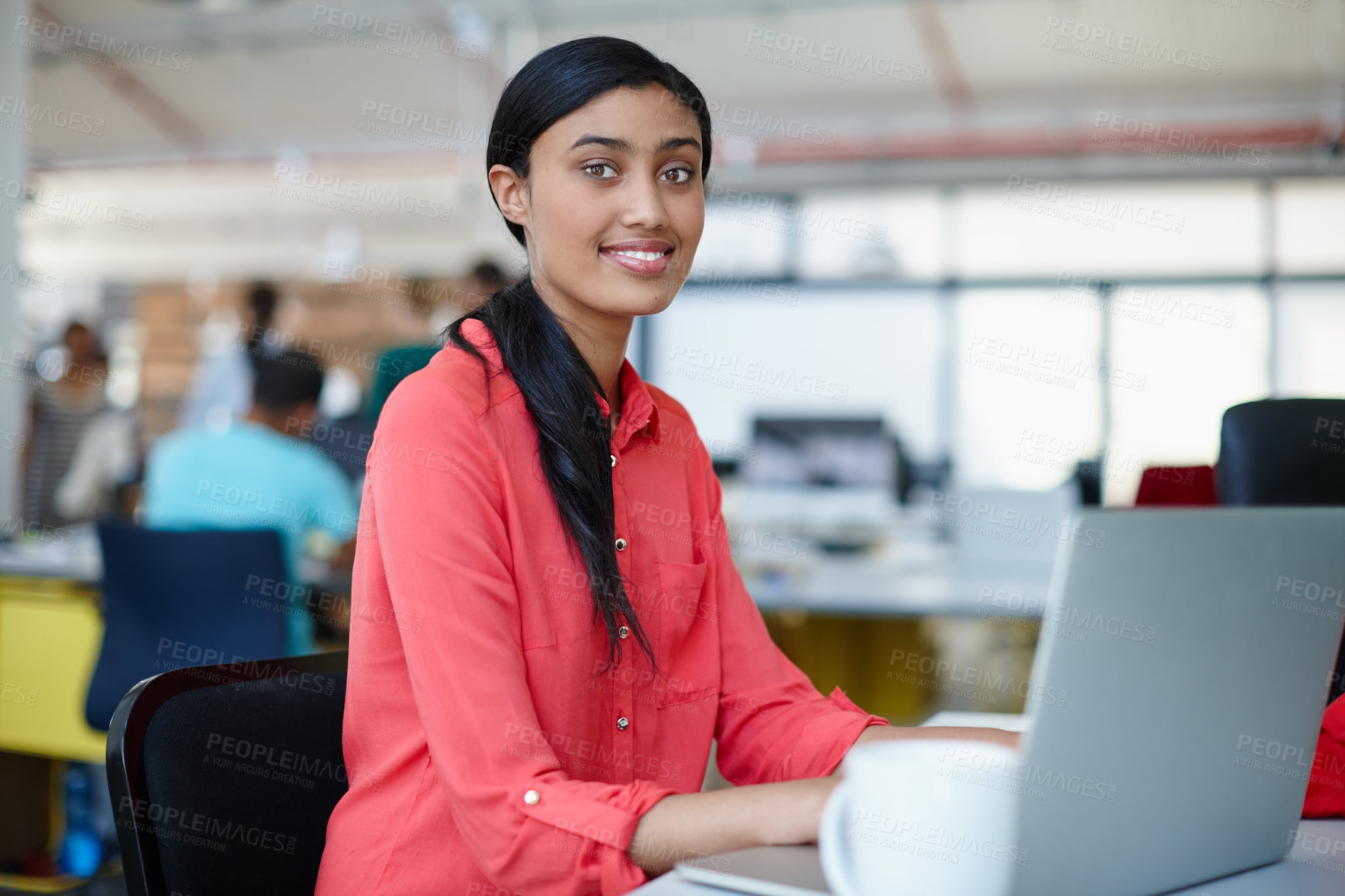 Buy stock photo Portrait of a young female designer working at her computer