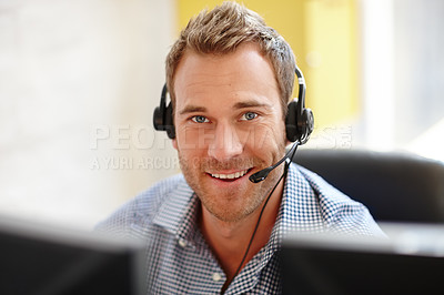 Buy stock photo Portrait of a male customer service representative at his computer