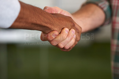 Buy stock photo Two casual men shaking hands