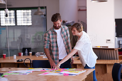 Buy stock photo Woman, man and discussion with notes at startup for project, point or problem solving at media company. People, teamwork and reading with documents for mind map, process and review at creative agency