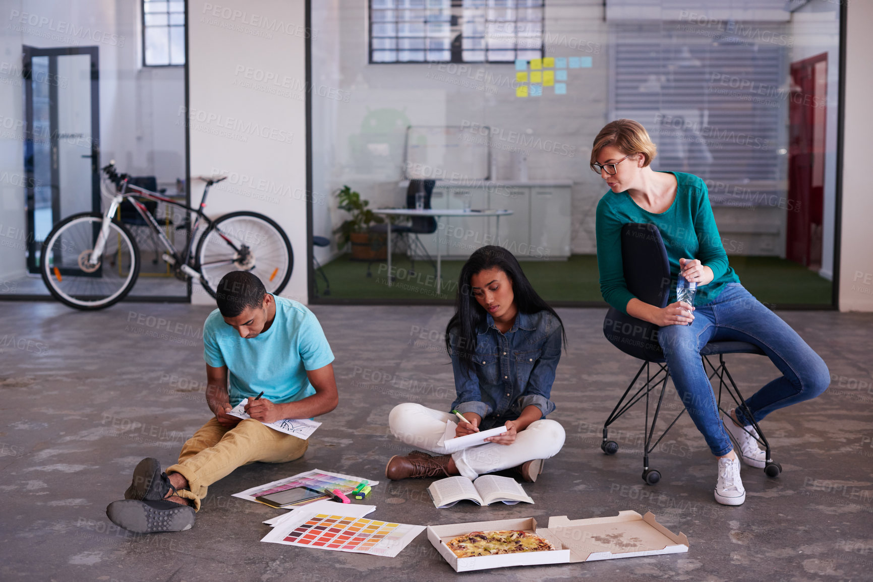 Buy stock photo Cropped shot of young designers working together in their office