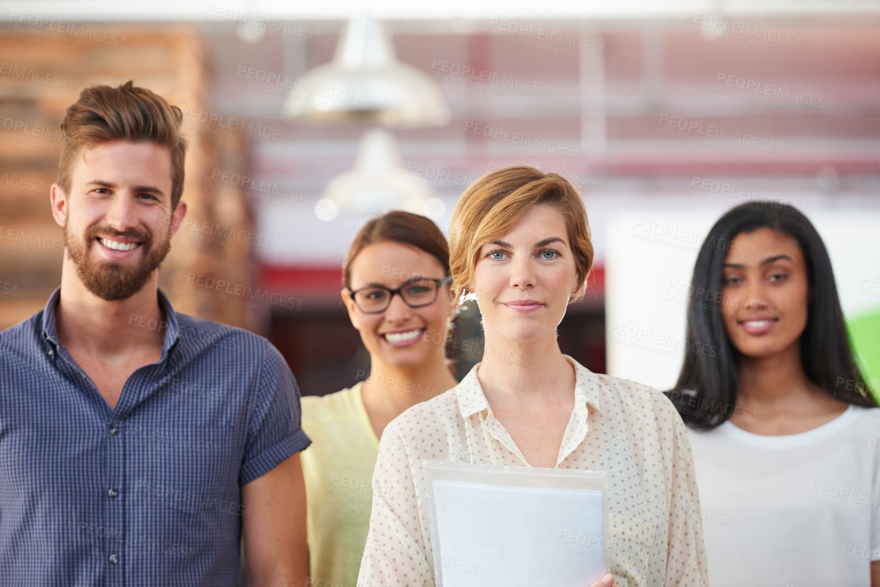 Buy stock photo Portrait of a team of confident colleagues in a casual working environment