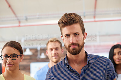 Buy stock photo Portrait of a team of confident colleagues in a casual working environment