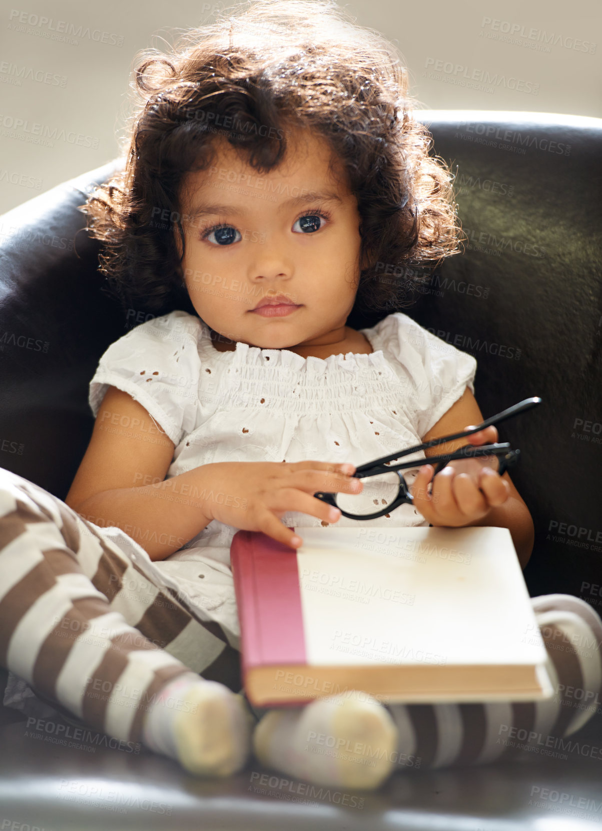 Buy stock photo Shot of a cute little girl at home