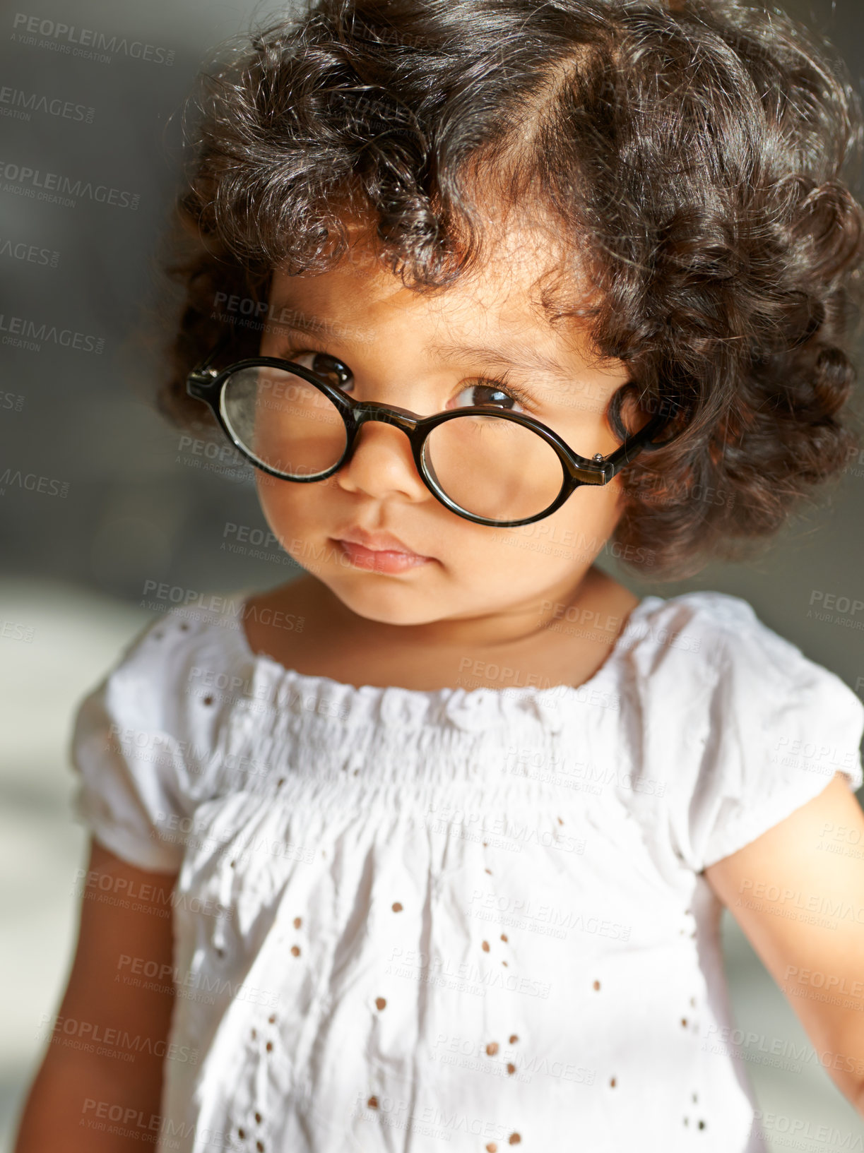 Buy stock photo Girl, toddler or glasses portrait or childhood learning, development growth or eyewear dress up for joke. Female person, spectacles or face for intelligence information playful funny, humor or comedy