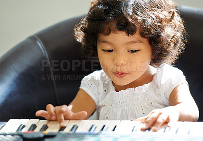 Buy stock photo Shot of a cute little girl at home