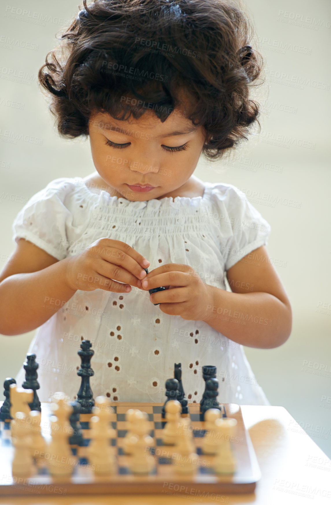 Buy stock photo Shot of a cute little girl at home