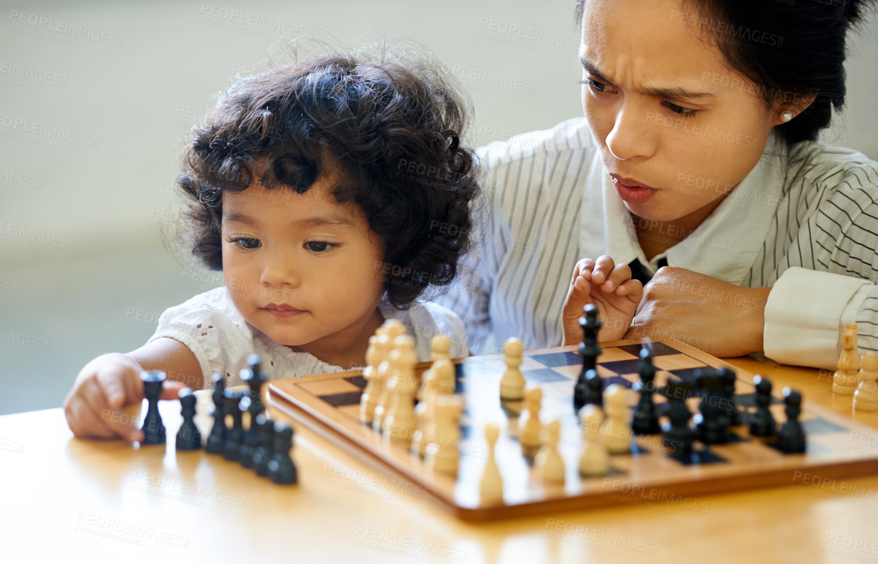 Buy stock photo Mother, girl and chess play fun for learning growth, development challenge or bonding time. Child, woman or board game for problem solving intelligence or kids lesson, planning knowledge or education