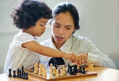 Buy stock photo Mother, girl and chess board play for learning growth, development challenge or bonding time. Child, woman or game fun for problem solving intelligence or kids lesson, planning knowledge or education