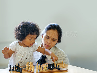 Buy stock photo Mother, child and chess play for learning growth, development challenge or bonding time. Girl, woman or board game fun for problem solving intelligence or kids lesson, planning knowledge or education