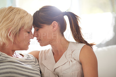 Buy stock photo Lesbian, couple and women with love at house for nose touch, marriage commitment or morning romance. People, lgbtq and relax with affection, bonding together and loyalty for relationship pride of hug