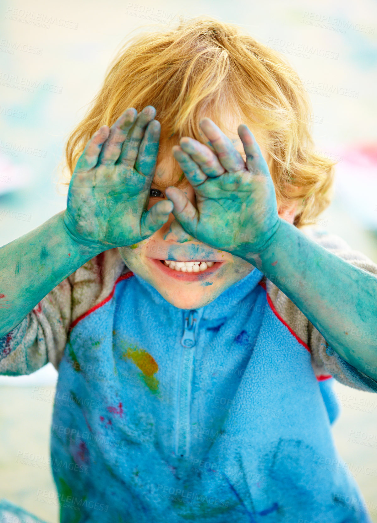 Buy stock photo Child, paint and mess or play portrait, happy boy in preschool for childhood fun. Educational development, smile or finger and face painting for art, vibrant or recreation activity for growth