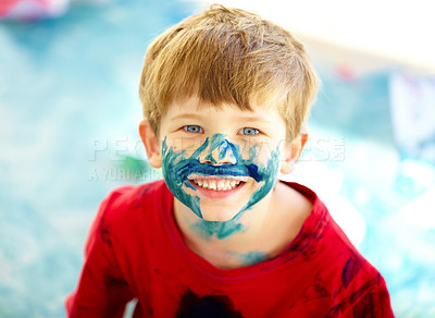 Buy stock photo Children, paint and smile or playing portrait, happy boy in preschool or childhood and fun. Educational development, mess for face painting for art activity, colorful and child growth in kindergarten