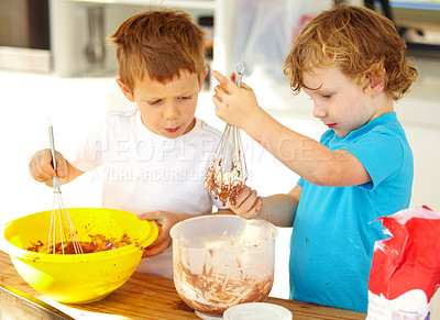 Buy stock photo Baking, kids and learning in kitchen in home for development of siblings making chocolate pastry. Children, brothers and mixing dough, flour and cooking food at table together for education in house