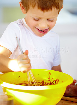 Buy stock photo Boy, mixing or bowl to play, baking or fun holiday activity as meal prep, nutrition or wellness. Chocolate, male child or whip on kitchen counter in playful, cooking or learning as weekend happiness