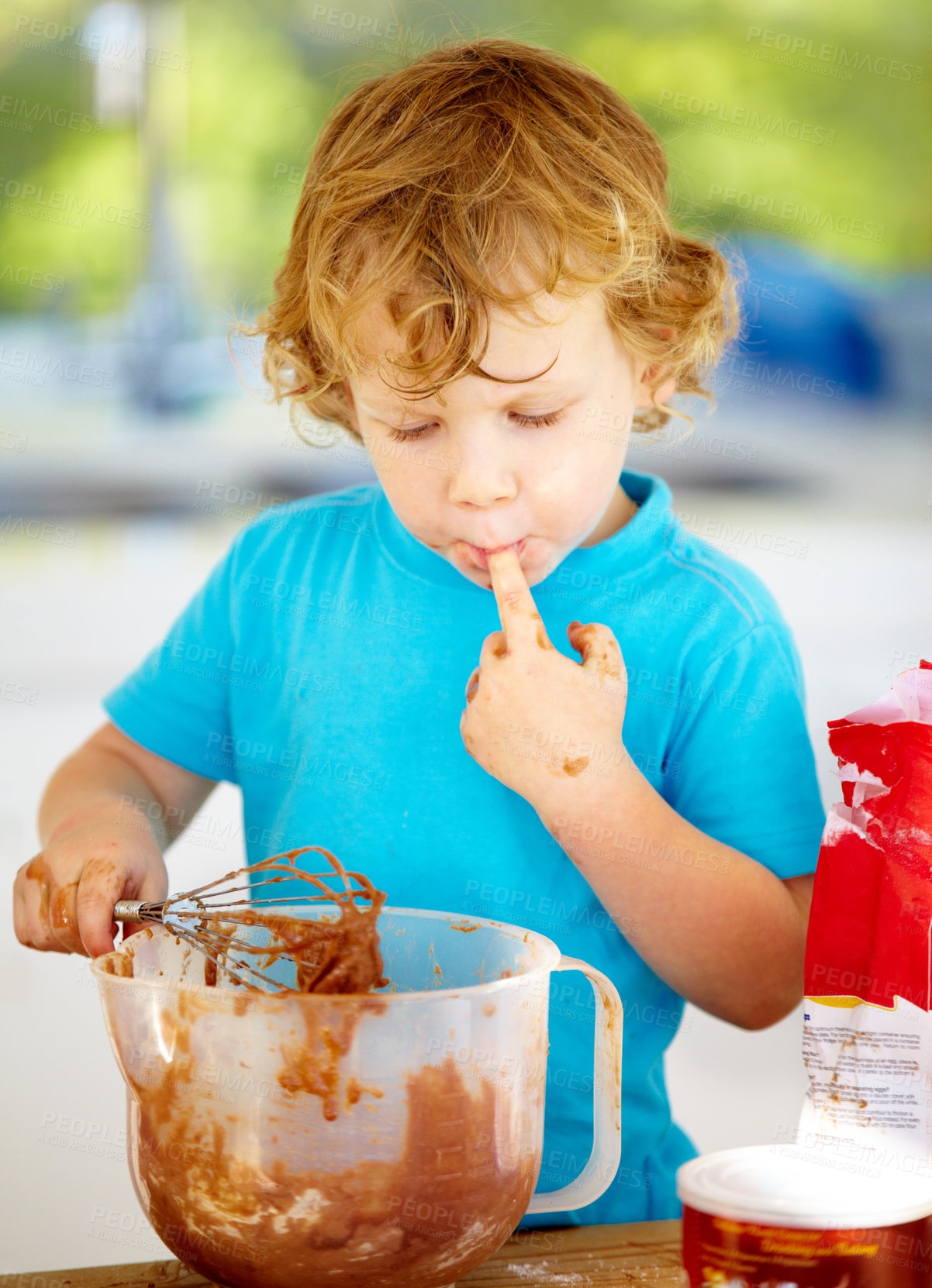 Buy stock photo A little boy covered in dough and flour