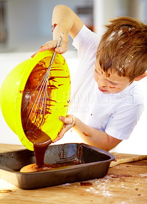 Buy stock photo Child, chocolate or bowl in messy, baking or playful activity as meal prep, growth or development. Naughty boy, food or mixture of ingredients as wellness, nutrition or holiday by learning in kitchen