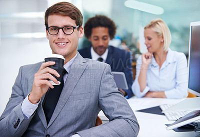 Buy stock photo Portrait of a confident businessman with colleagues in the background
