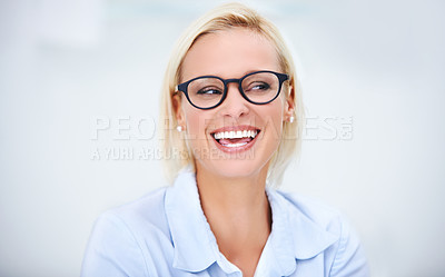 Buy stock photo Candid shot of a confident businesswoman wearing glasses
