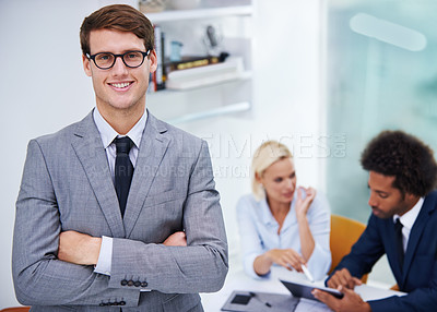 Buy stock photo Businessman, happy and confident in office for portrait, professional and expert in law firm. Lawyer, smile or arms crossed in meeting for leadership, trust or attorney team for case building in city