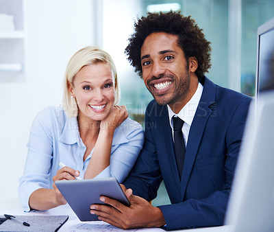 Buy stock photo Portait shot of two colleagues smiling happily in their office