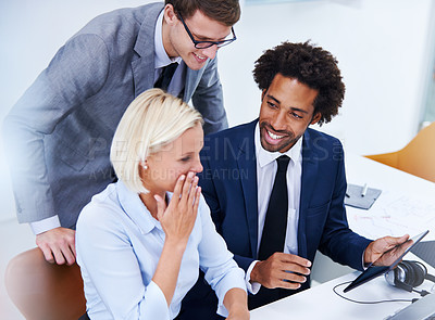 Buy stock photo Shot of a busineswoman responding to something on a digital tablet