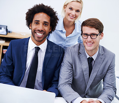 Buy stock photo Portrait of three colleagues smiling at the camera