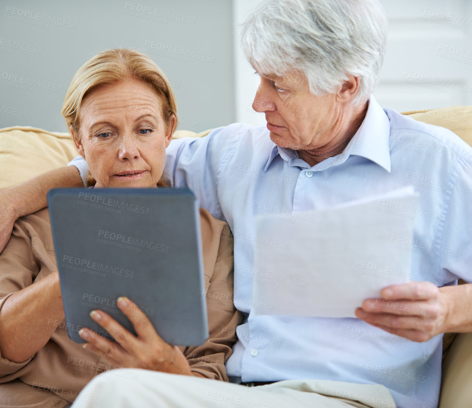 Buy stock photo Old couple, budget and tablet for finance in home, planning and asset management in retirement. Senior people, banking website and review savings account, talking and documents for tax application