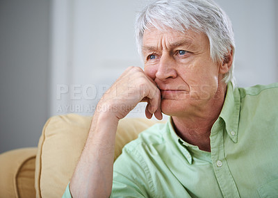 Buy stock photo Senior man, thinking and reflection on sofa in home with ideas, memory and perspective in retirement. Elderly person, sad and remember with nostalgia, wonder and insight for decision in living room