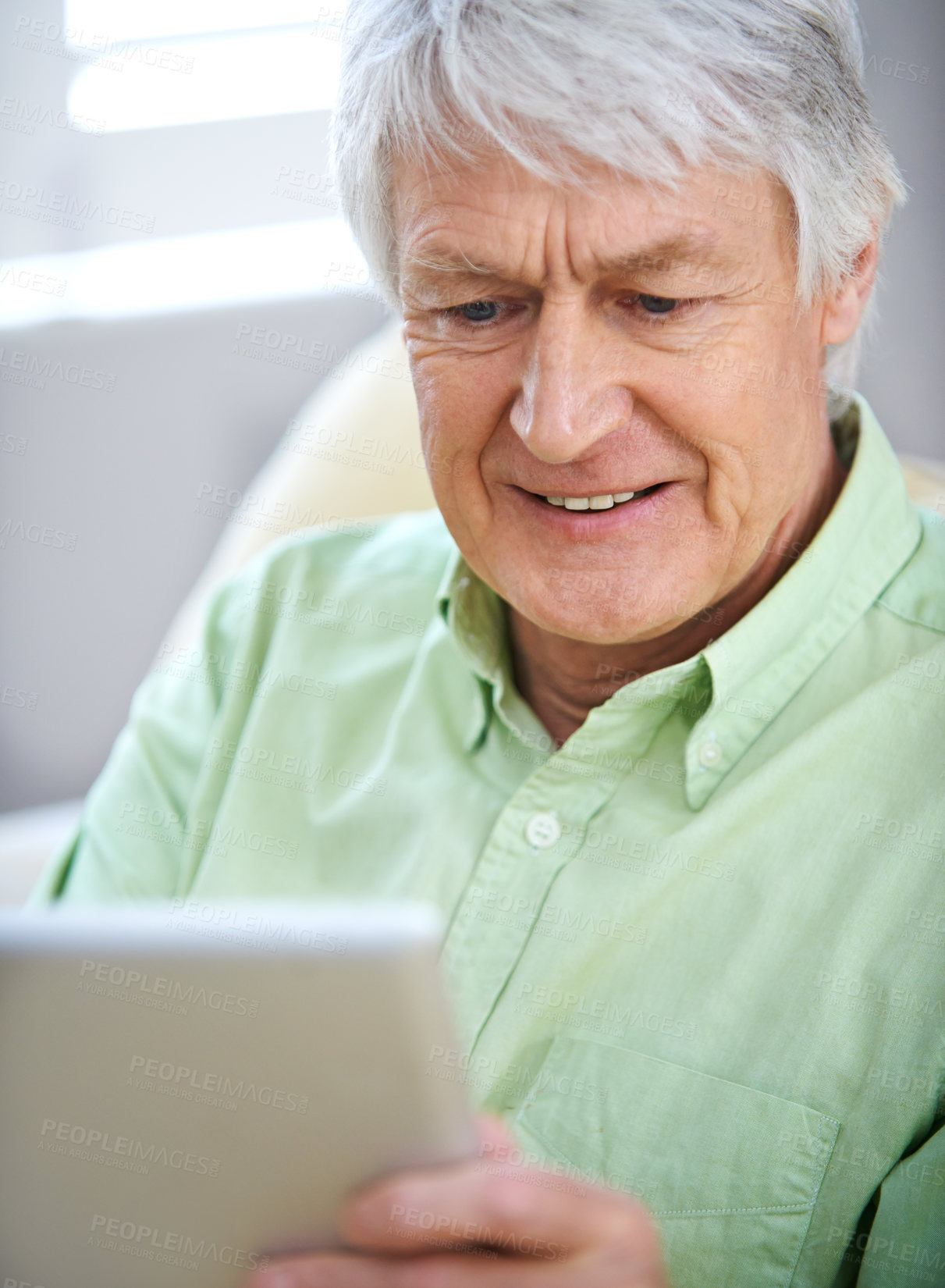 Buy stock photo Tablet, happy and senior man in home on internet for social media, website and online entertainment. Retirement, relax and elderly person on digital tech for search, reading news and connection