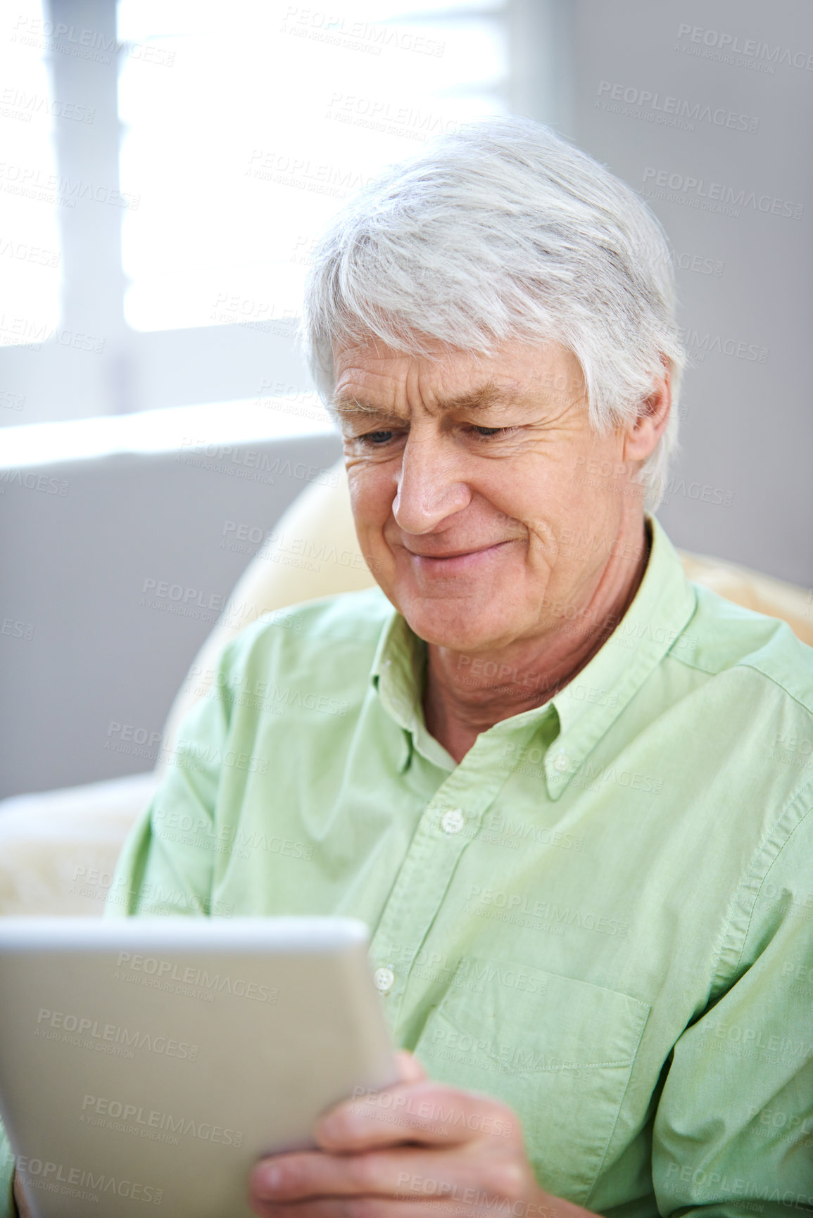 Buy stock photo Tablet, sofa and elderly man in home on internet for social media, website and online entertainment. Retirement, relax and senior person on digital tech for search, reading news and connection