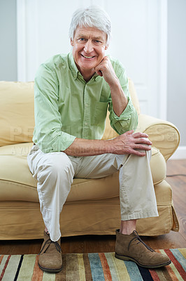 Buy stock photo Smile, portrait and senior man on sofa in home with confidence, wellness and retirement. Happy, relax and elderly person on couch in living room with pride, peace and calm weekend in apartment