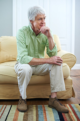 Buy stock photo Senior man, thinking and memory on sofa with smile, reflection or choice with perspective in retirement. Elderly person, happy or remember for nostalgia, wonder or insight for decision in living room