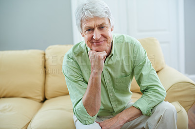 Buy stock photo Smile, portrait and senior man on couch in home with confidence, wellness and retirement. Happy, relax and elderly person on sofa in living room with pride, peace and calm weekend in apartment