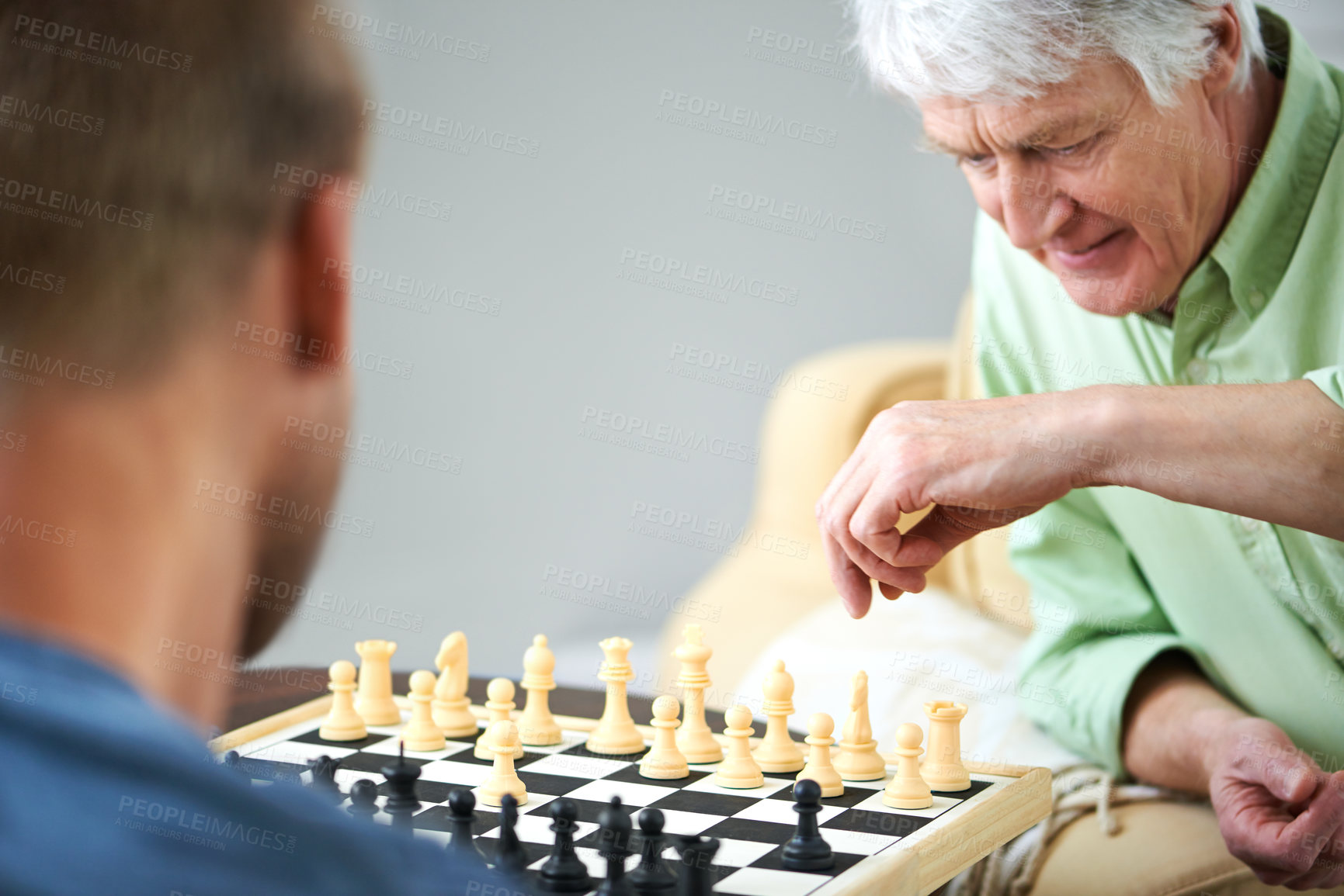 Buy stock photo Senior father, son and chess in home with challenge, game or play with strategy for competition. Elderly person, men and together by board for queen, king and pawn for contest, bonding and retirement