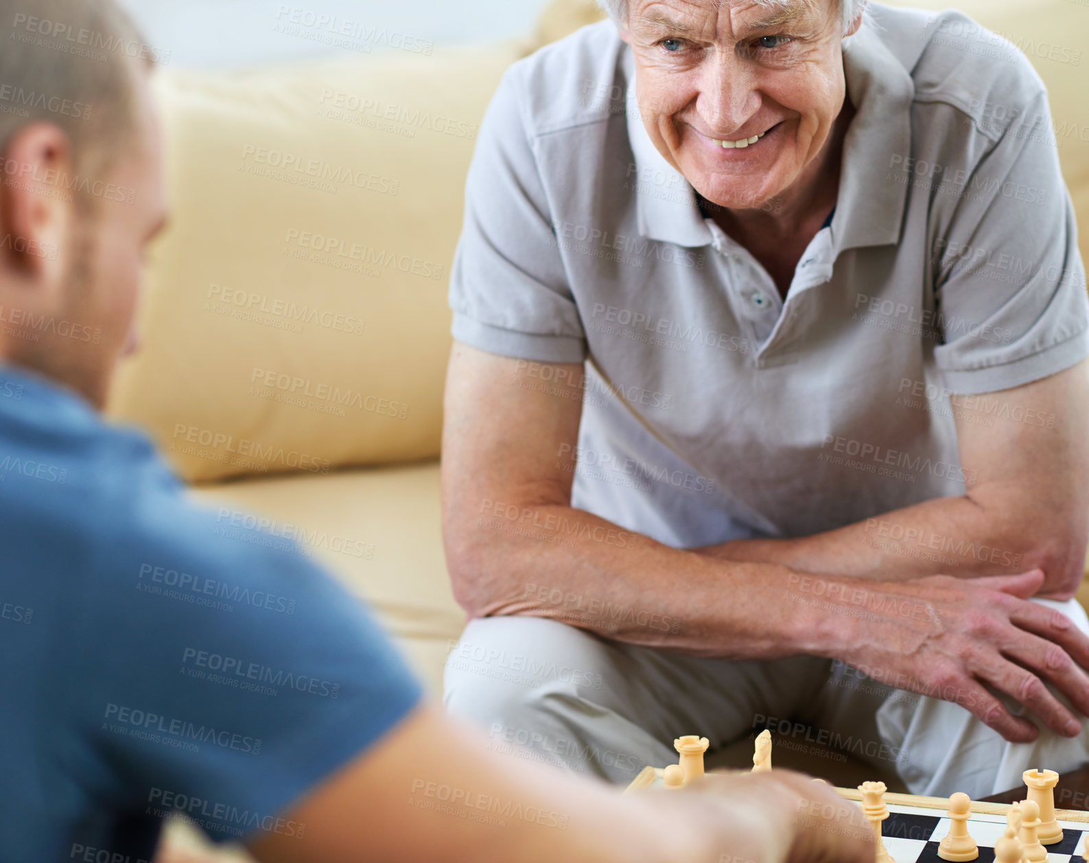 Buy stock photo Mature dad, happy man or playing chess in home for games or challenge with strategy or problem solving. Senior parent, smile or board for checkmate or learning thinking skills for cognitive function