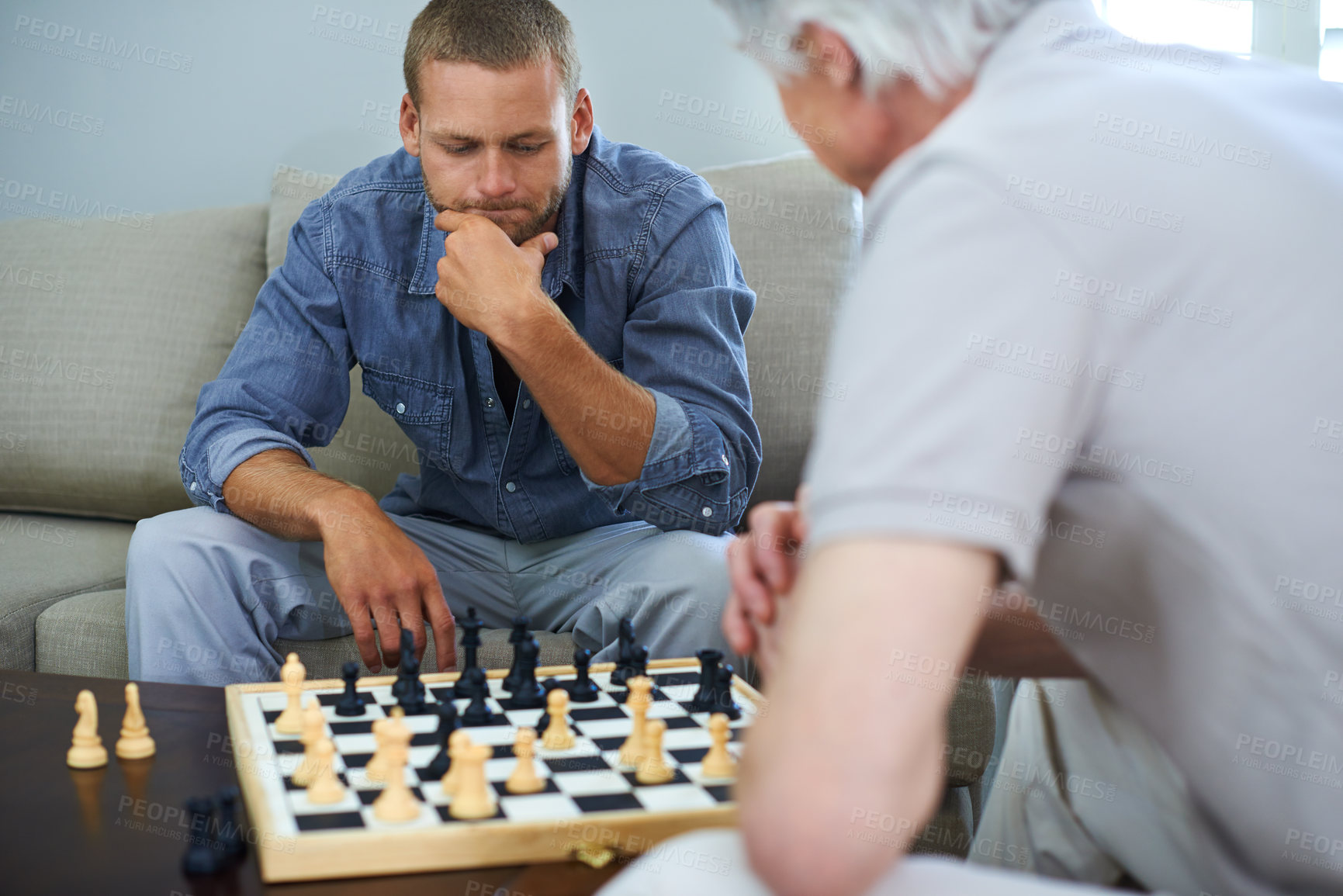 Buy stock photo Dad, man or thinking of chess move in home for games or contest for strategy and problem solving. Senior, parent or board for challenge, checkmate or learning mental skills for cognitive function