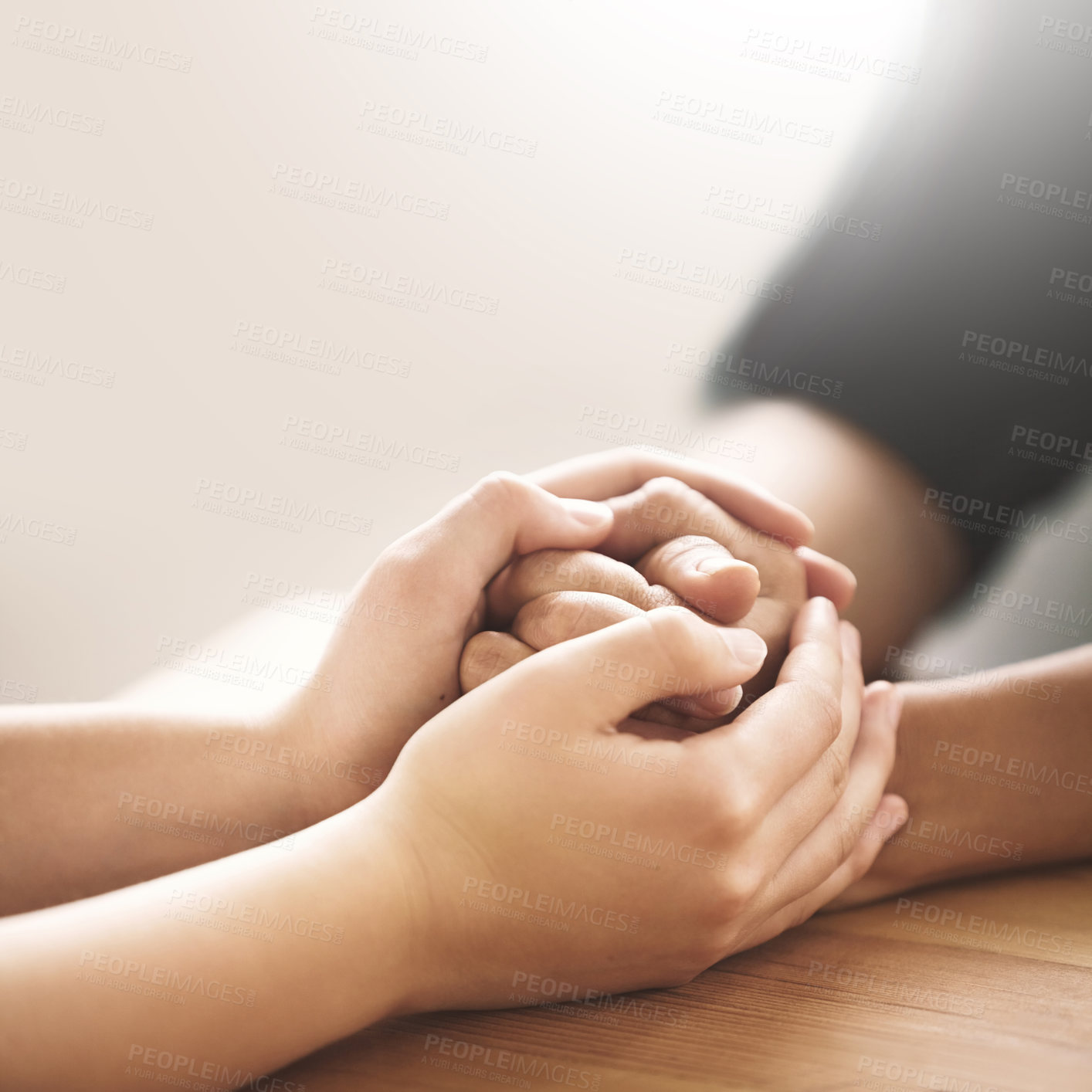 Buy stock photo Cropped shot of two people holding hands in comfort