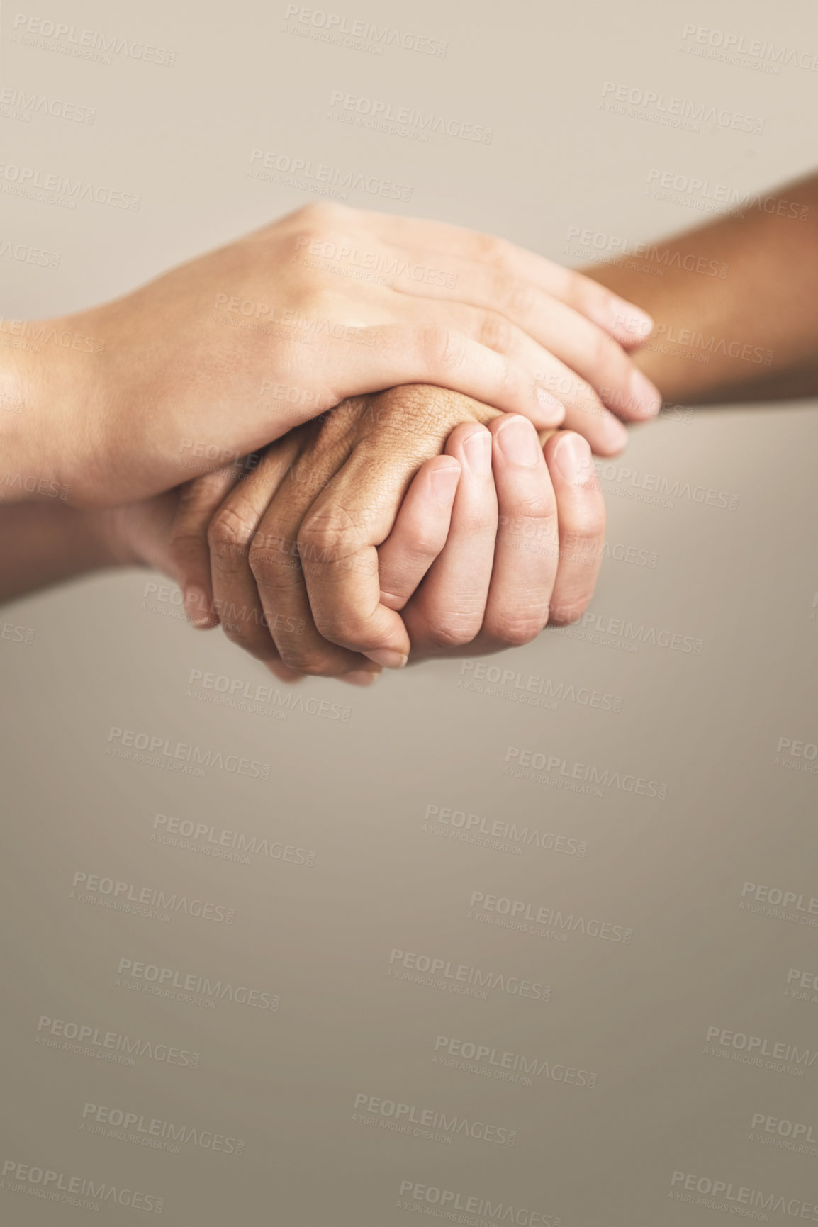 Buy stock photo Cropped shot of two people holding hands in comfort