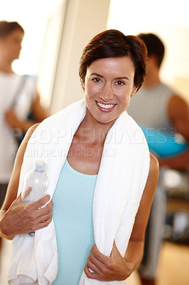 Buy stock photo Fitness, woman and portrait with water bottle in gym for hydration, exercise and relax with workout. Person, face and happy with sweat towel at sports center for healthy cardio wellness and training