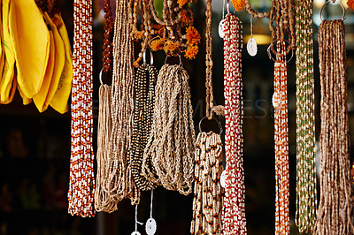 Buy stock photo Meditation, beads and culture at store outdoor for Indian tradition, religion prayer and spiritual accessories. Retail, design and local craft for jewellery, creative texture and colourful decoration