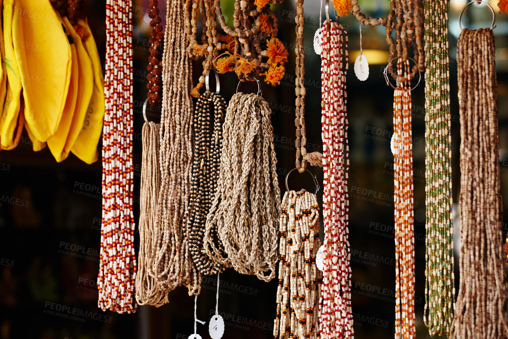 Buy stock photo Meditation, beads and culture at store outdoor for Indian tradition, religion prayer and spiritual accessories. Retail, design and local craft for jewellery, creative texture and colourful decoration